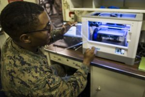 Army officer creating 3d printed object