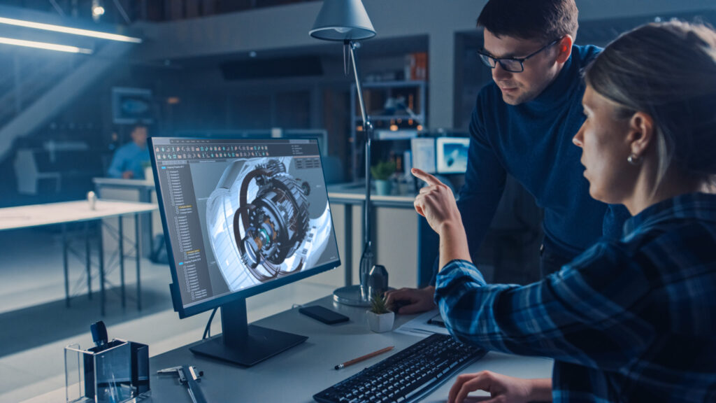 Engineers analyzing CAD Software